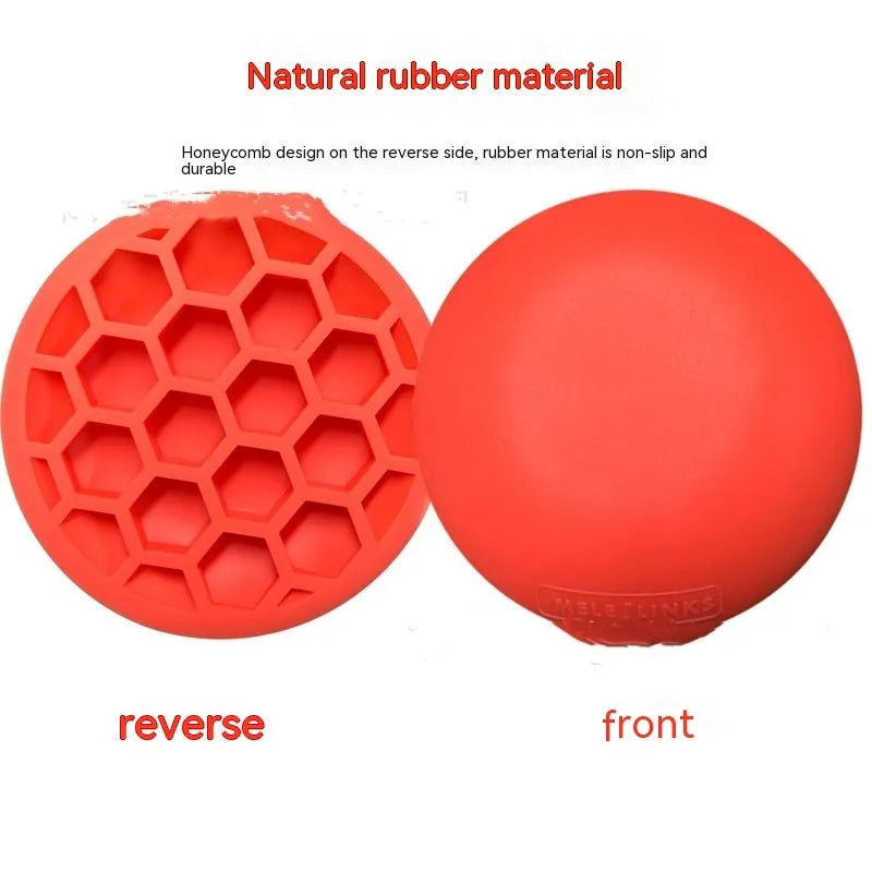 Orange golf training mat with centre of gravity pattern on natural rubber surface