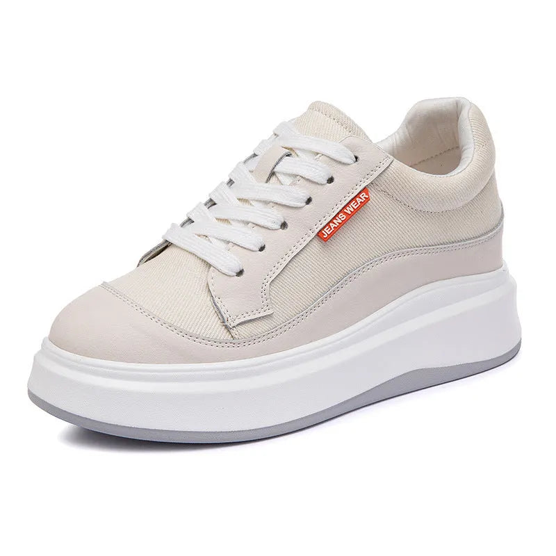 Women's pink leather board shoes with thick white soles on a neutral background