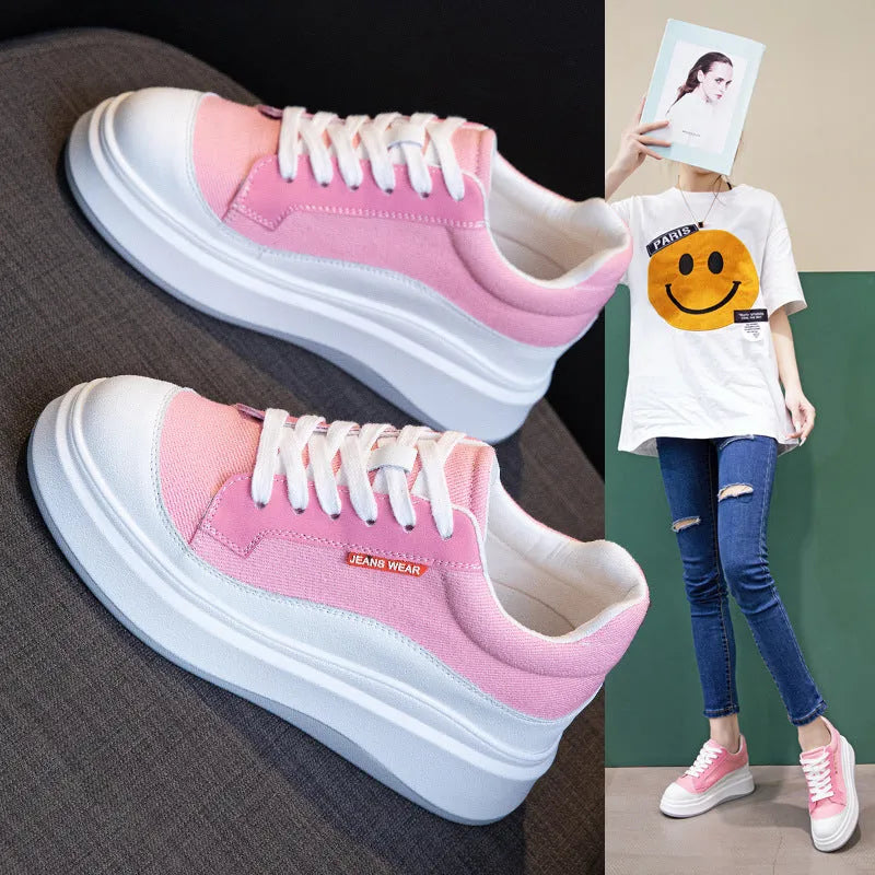 Women's pink leather board shoes with thick white soles on a neutral background