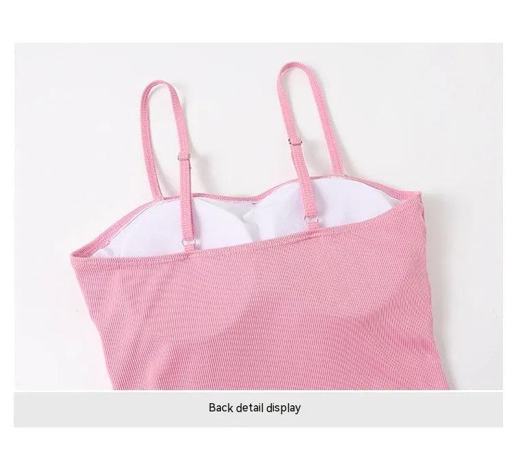 Women's long sleeve one-piece swimsuit in polyester fabric available in pink or black