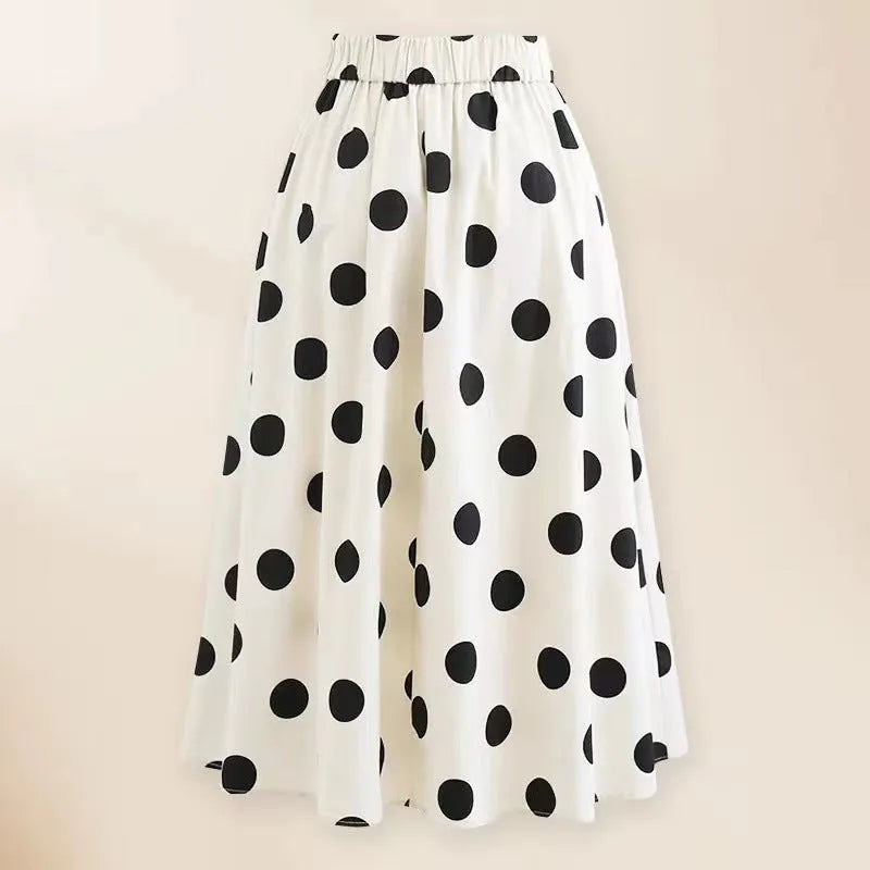 Women's black one-piece swimsuit with white bow and skirt for swimming