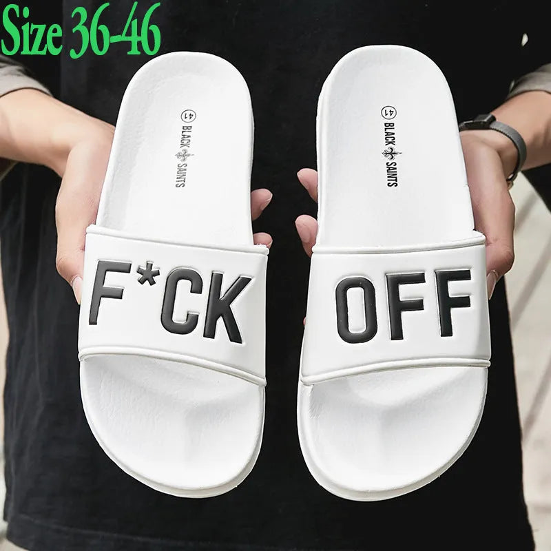Large size men's black open toe slippers with a rubber sole, shown from the side.