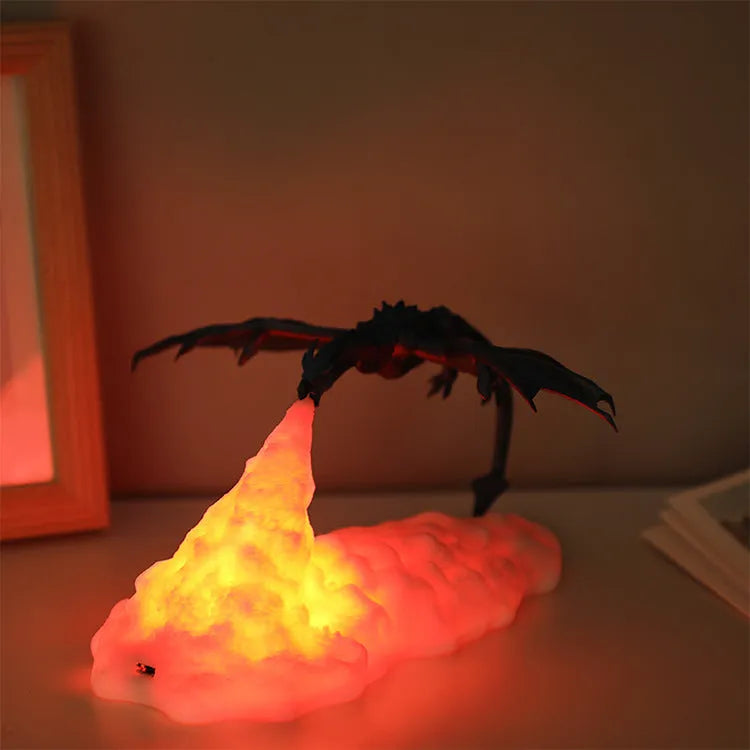 3D printed fire-breathing dragon night light with warm red glow and USB charging cable