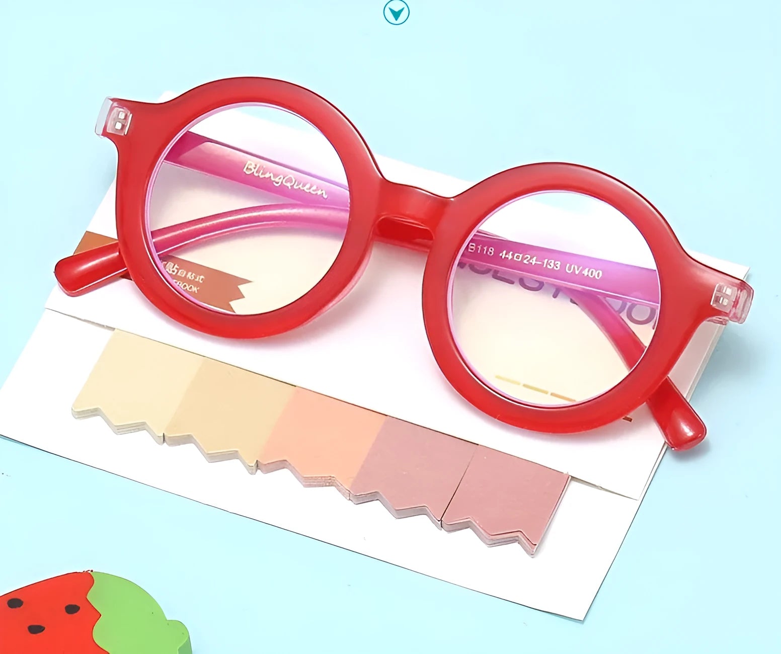Retro round plastic frame glasses with clear anti-blue light lenses in multiple colour options.
