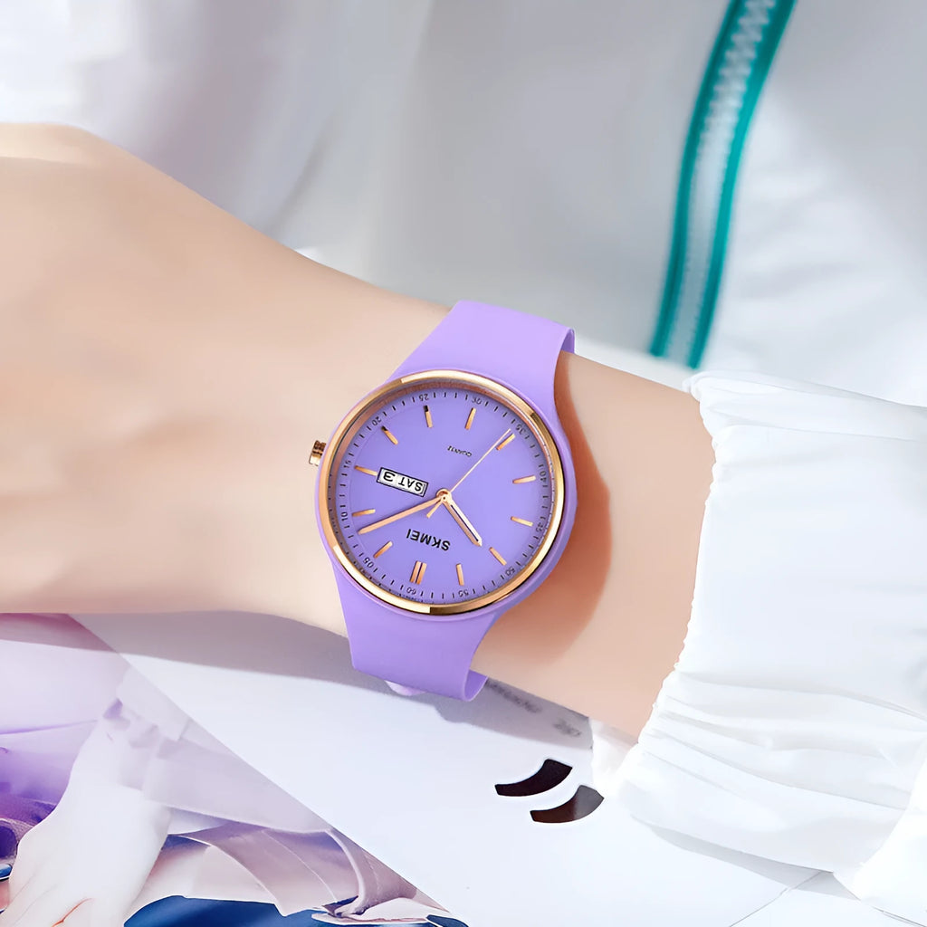 Women's quartz watch with silicone strap in multiple colours showing 42mm dial with calendar display