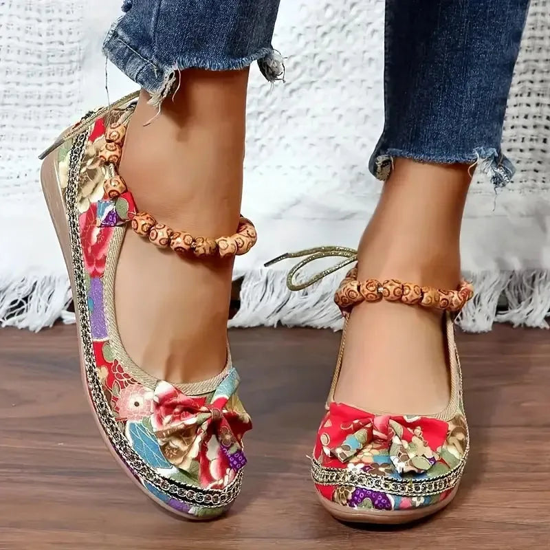 Women's black ethnic style platform sandals with cloth upper and elastic band, plus size range.