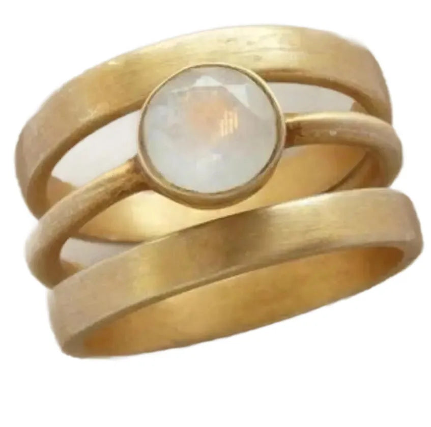 Gold-plated geometric titanium steel ring with hollow micro-inlaid white chalcedony detail.