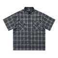 Men's black and brown plaid short sleeve shirt with embroidery detail and lapel collar