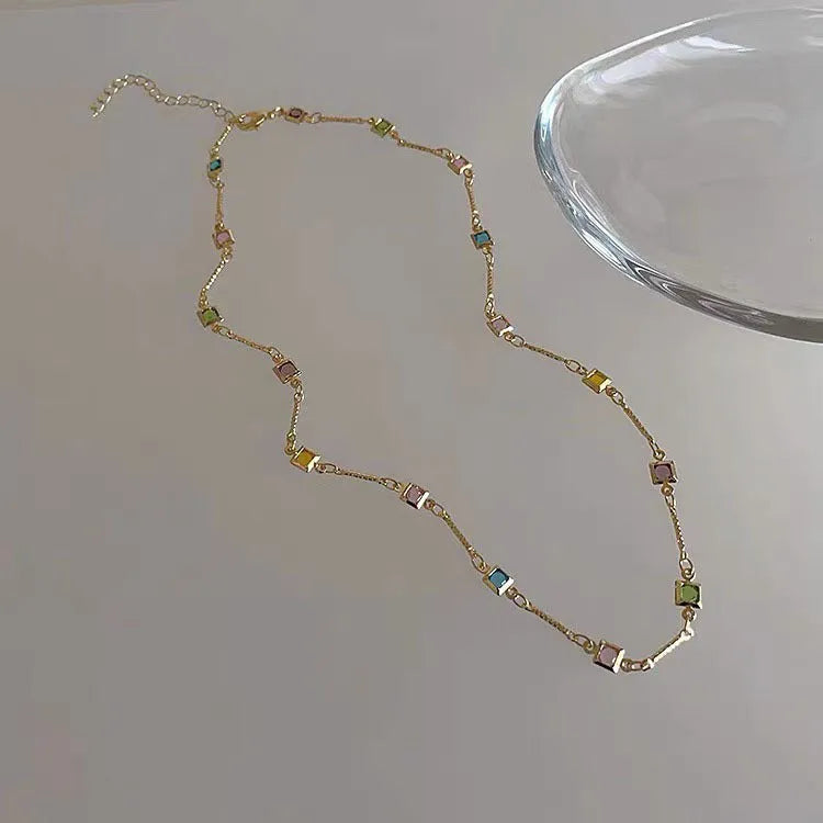 Square colour clavicle chain necklace with geometric artificial crystal design in gold alloy finish