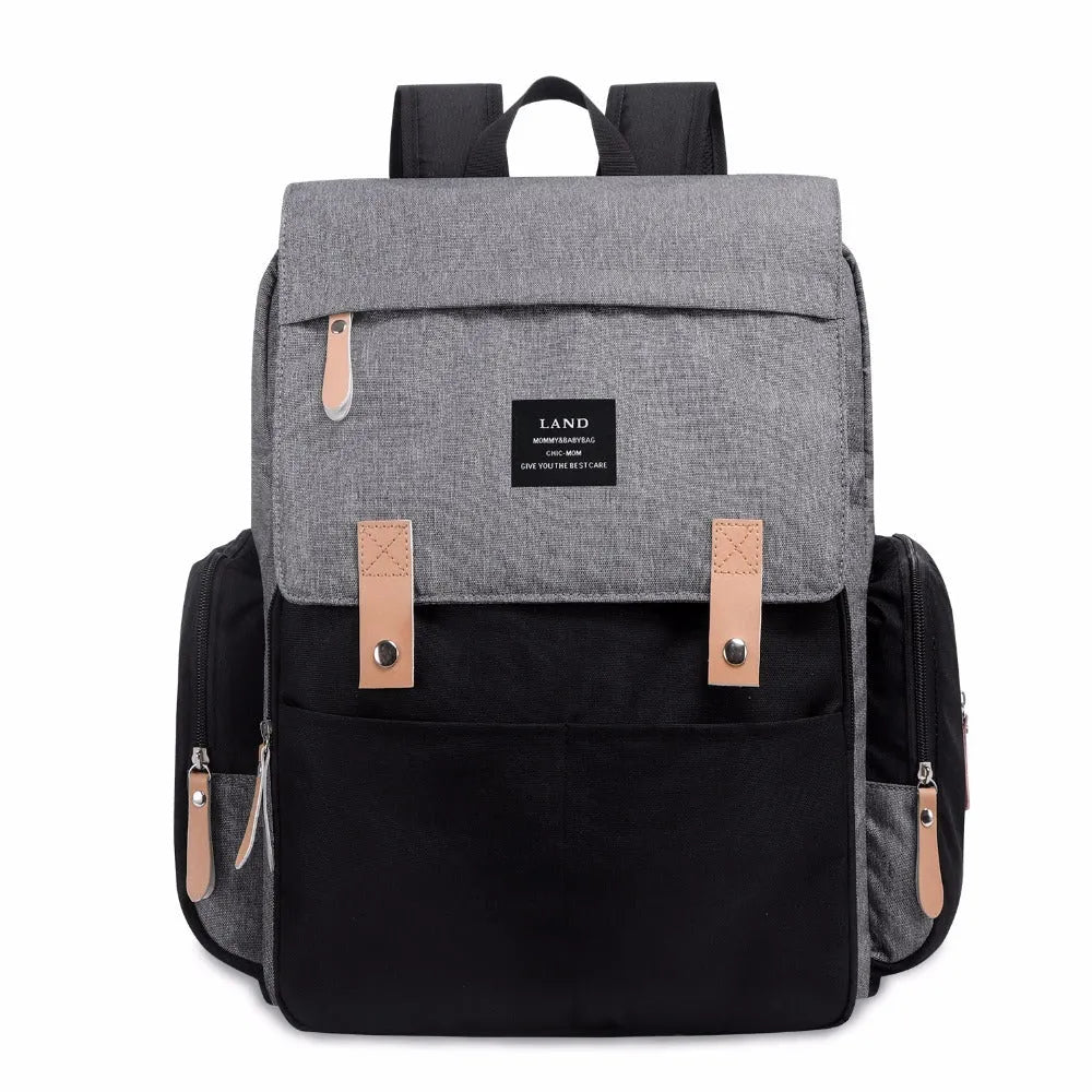 LAND Mommy large oxford cloth diaper backpack with changing mat in beige colour.