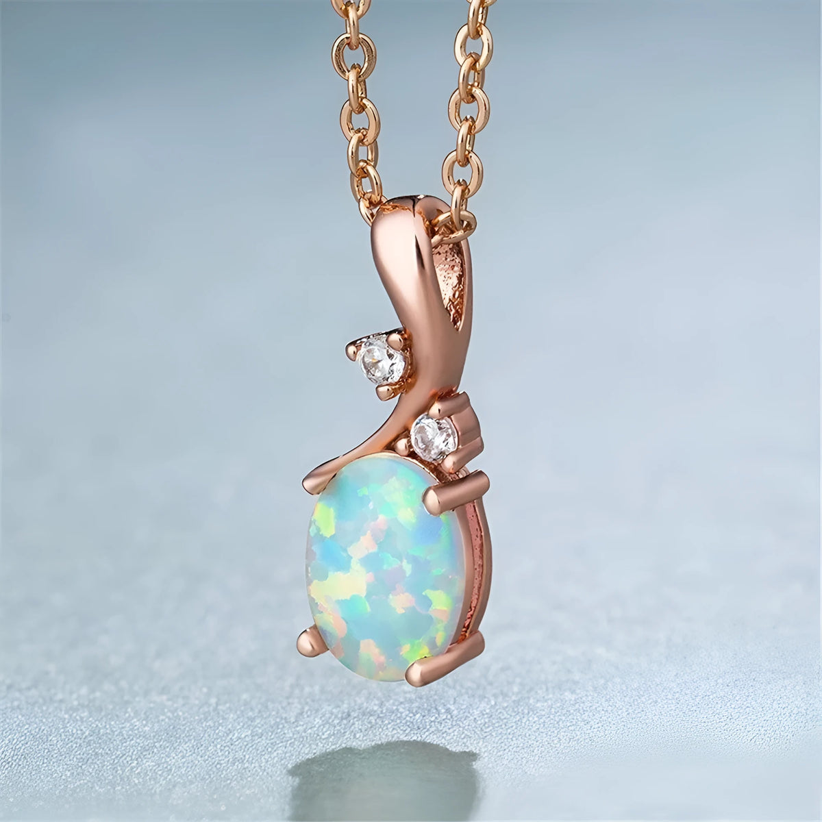 Water drop shaped opal pendant on an adjustable O-shaped electroplated alloy necklace chain