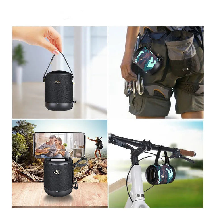 Waterproof portable bluetooth speaker in black with carrying strap