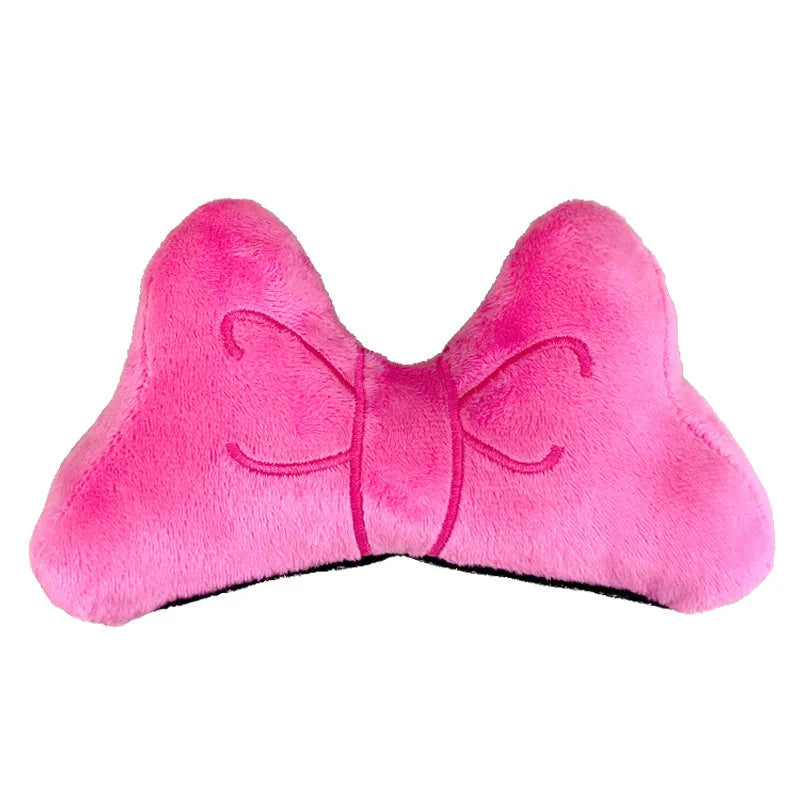Soft plush bow helmet decoration with pom-pom in red, pink, and peach colour options.
