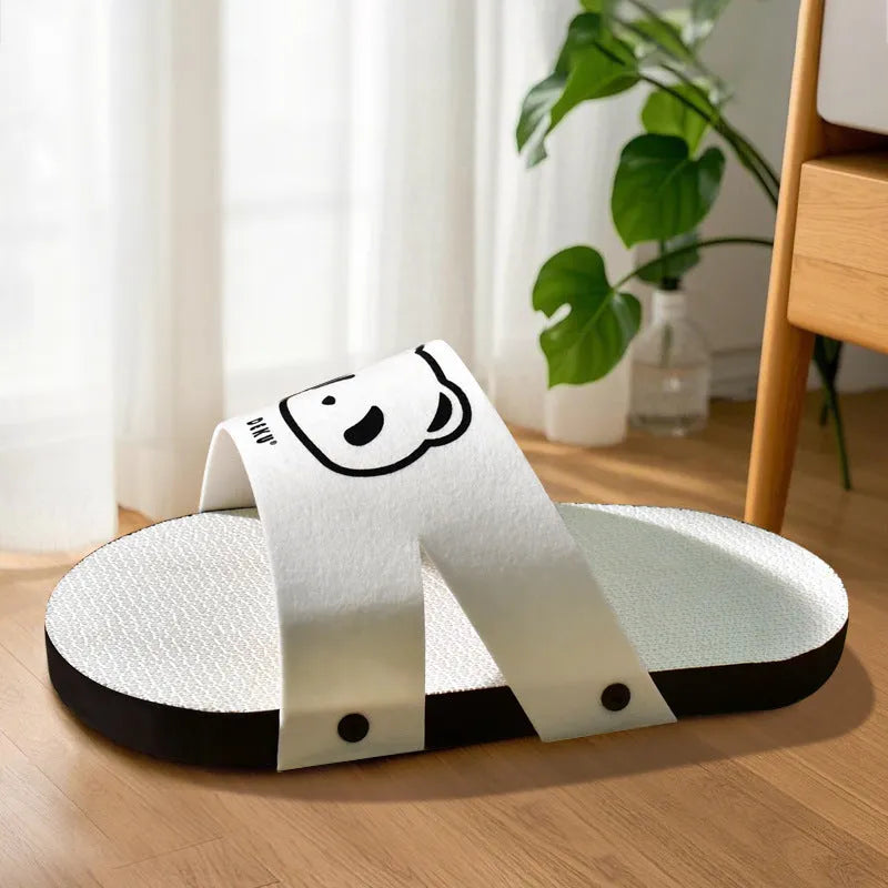 White slipper-style corrugated paper cat scratch board for feline claw care