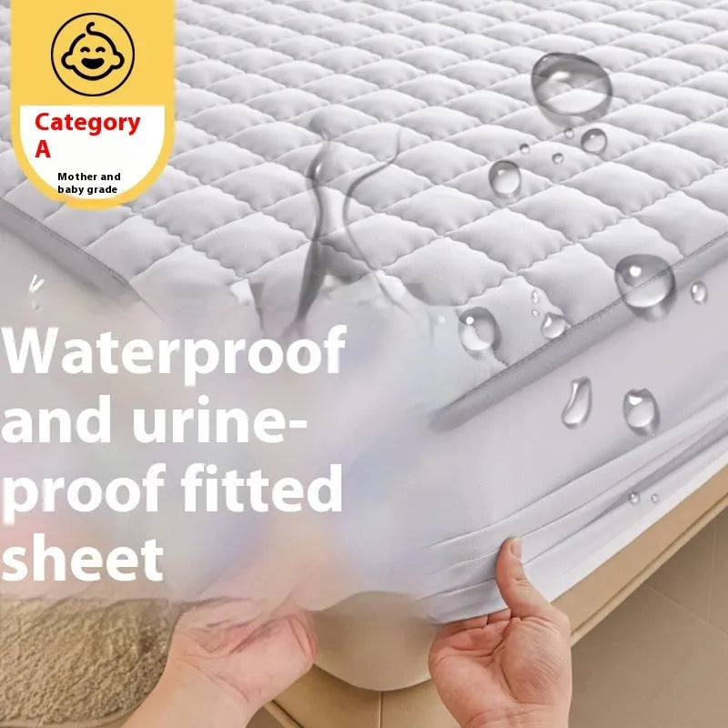 Blue washed cotton waterproof fitted sheet with elasticated corners on a mattress.