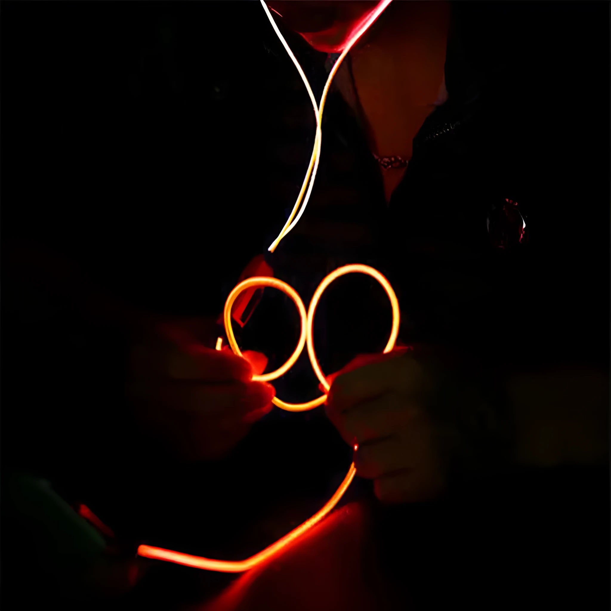 Blue Magic Light LED earphones with illuminated light lines, 3.5mm plug, and remote microphone.