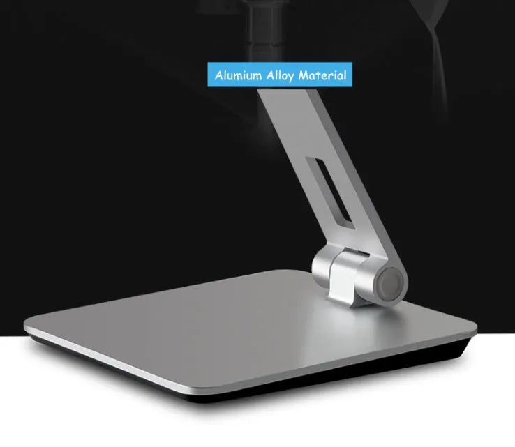 Foldable aluminium desktop phone and tablet holder in silver showing 360-degree rotation