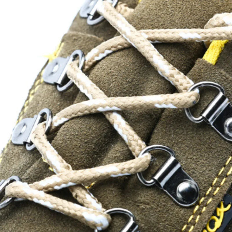 Bronze cow suede leather men's safety boots with a steel toe cap and patterned non-slip sole.