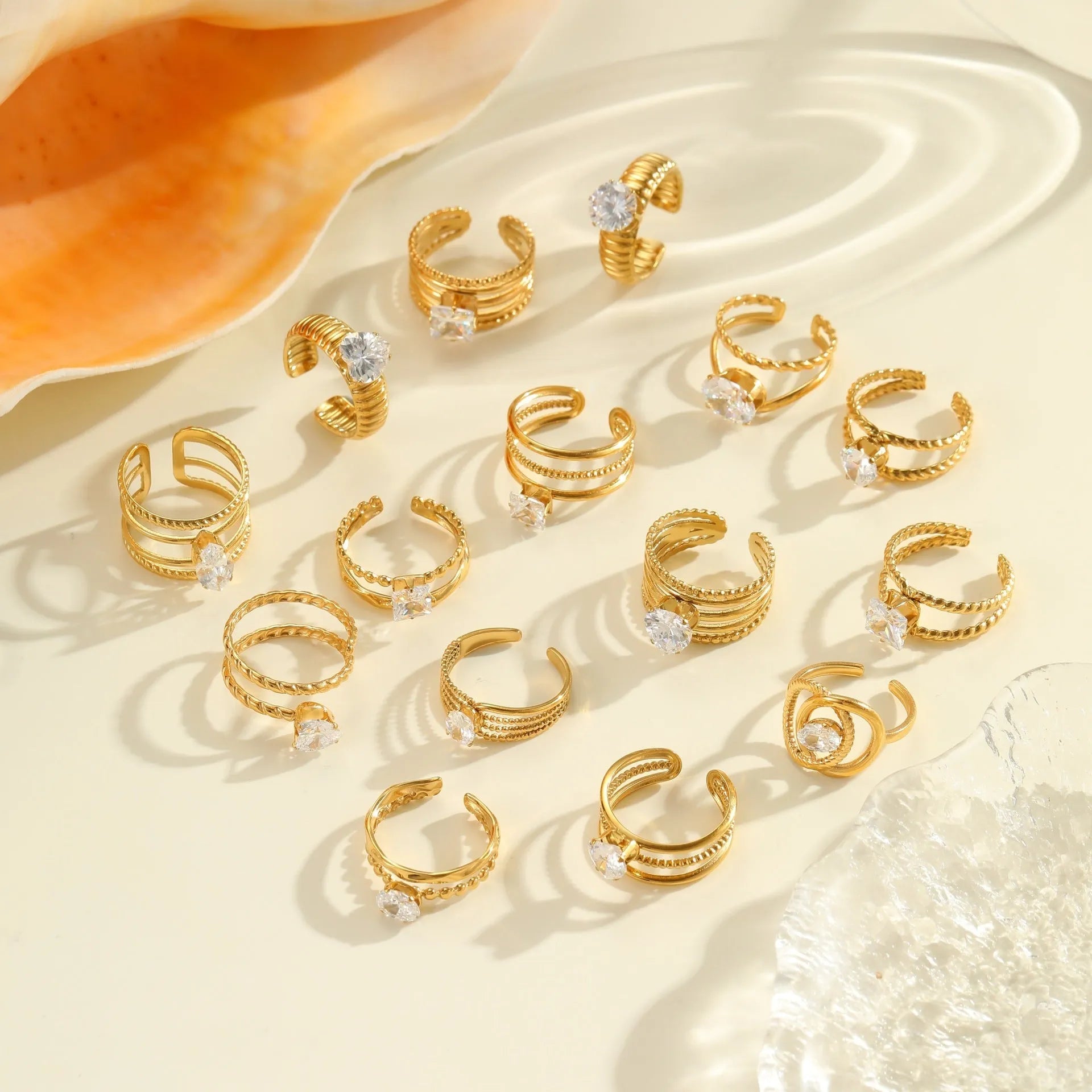 Geometric stainless steel open mouth ring with gold inlaid zircon detailing