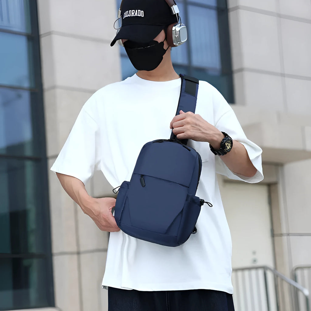 Men's grey waterproof chest bag showing dimensions and polyester lining interior
