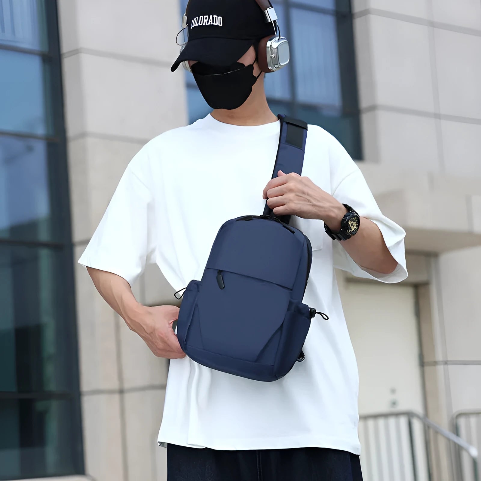 Men's grey waterproof chest bag showing dimensions and polyester lining interior