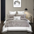 Four-piece cotton embroidery bedding set in satin weave with choice of decorative patterns