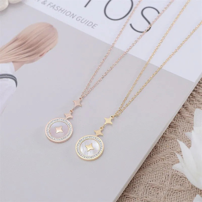 Close-up of a hexagonal six-pointed star titanium steel pendant necklace on a gold O-ring chain.