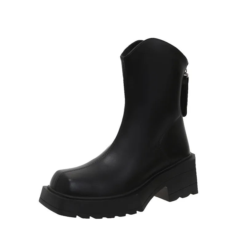 Women's black platform Martin boots with square toe, chunky sole, back zipper, and block heel.