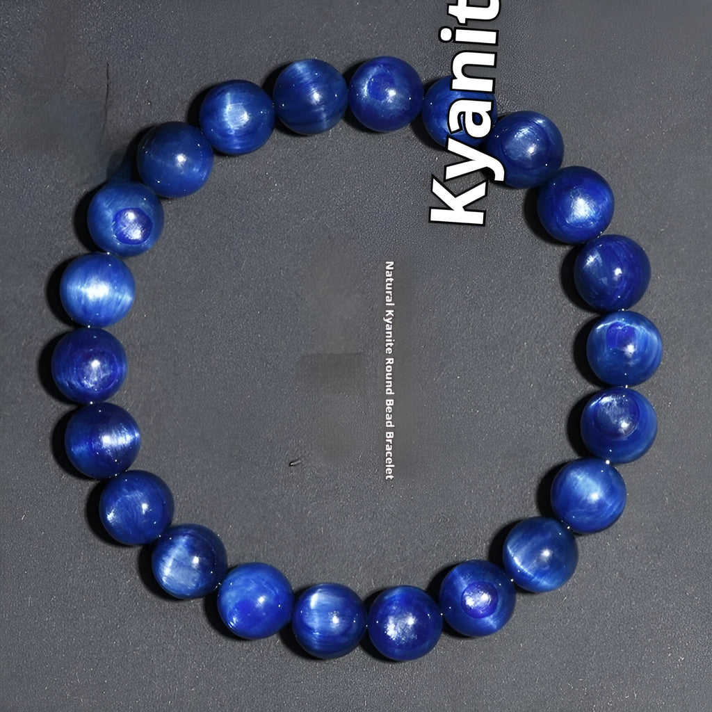 Natural blue crystal geometry ball bracelet with Ruyi charm on a white background.