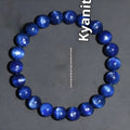 Natural blue crystal geometry ball bracelet with Ruyi charm on a white background.
