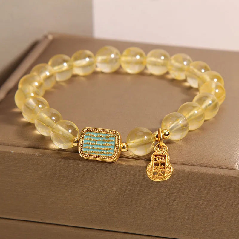 Women's citrine yellow crystal bracelet with rhinestone decorative elements