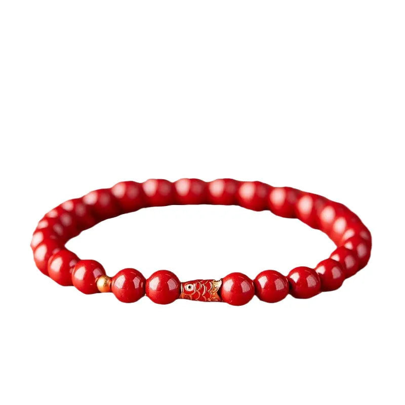 Handmade natural cinnabar bracelet with koi fish and golden ball charms in national style