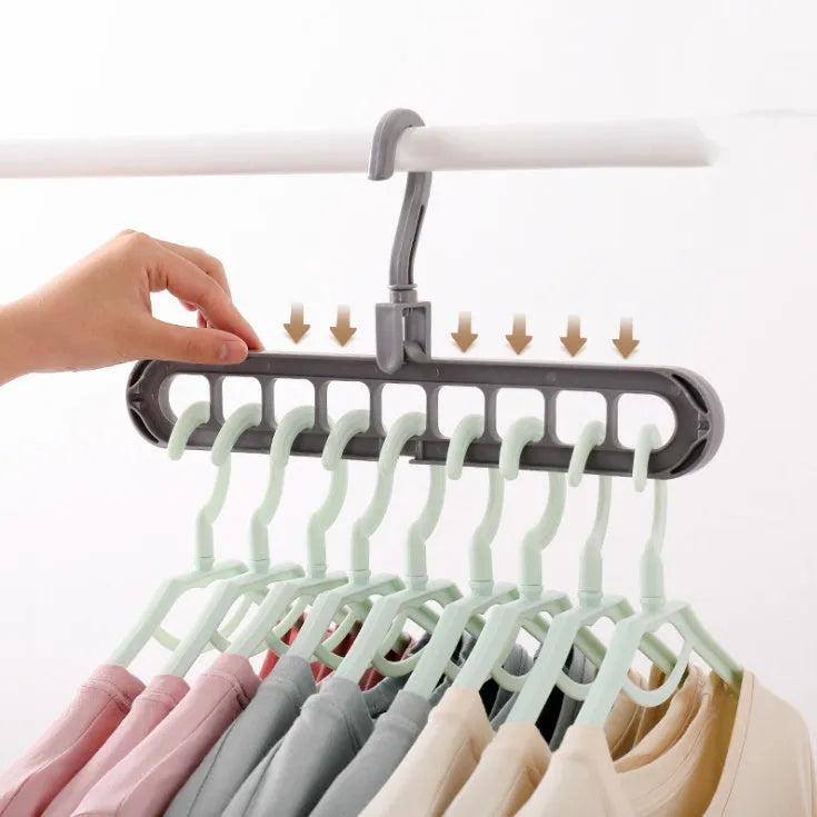 Plastic clothes hanger hook with rotating handle in various colours including pink and green.