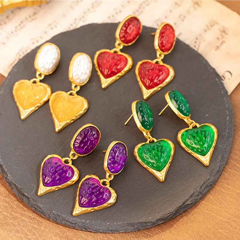 Silver needle pleated oval love heart stud earrings in purple, red, green, and yellow white colours.