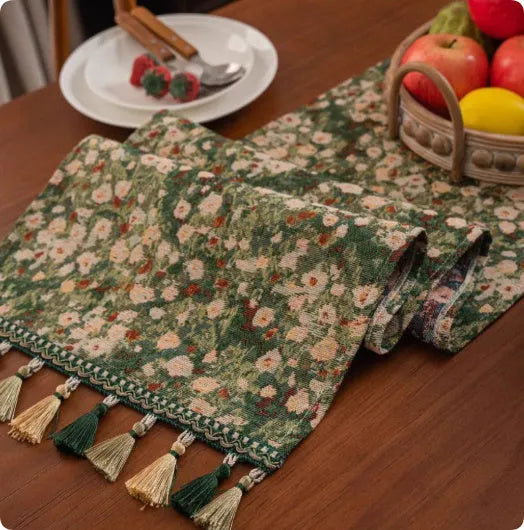 European retro cotton linen style table flag with handwoven tassels in blue ginkgo leaves pattern on sideboard
