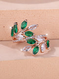 Adjustable copper leaf ring with zircon detailing in multiple colour options on display