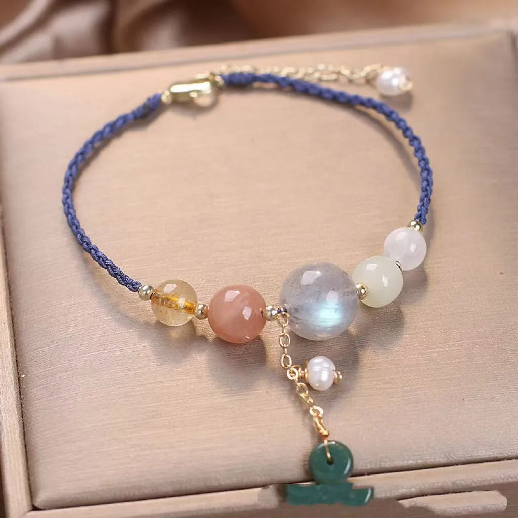 Hand-woven crystal sequin bracelet with peace buckle closure in blue, green and red colour options