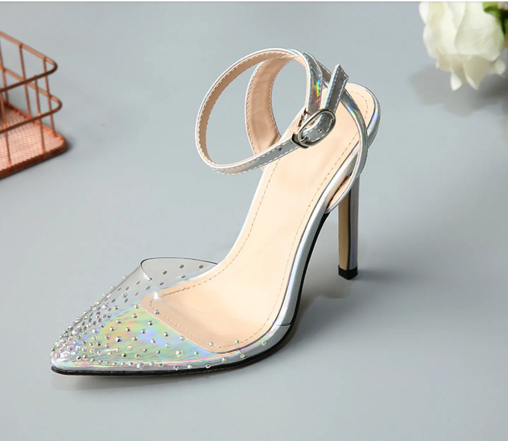 Women's pointed toe sandals with stiletto heel and diamond detail, made from PVC, shown on a size chart.