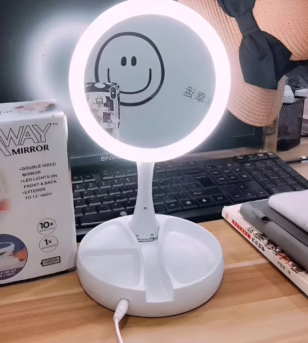 White foldable double-sided LED vanity mirror with built-in storage compartments and USB cable.