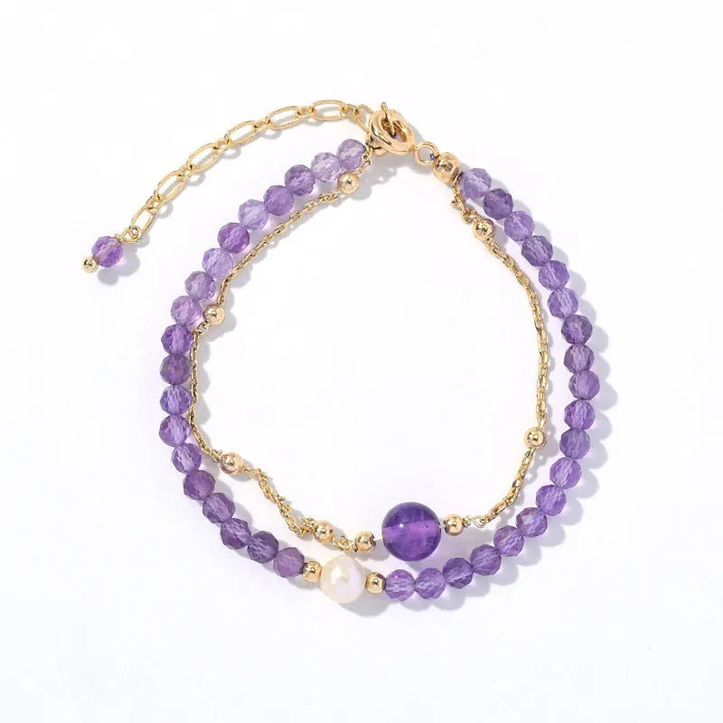 Amethyst-coloured crystal bracelet with diamond-shaped elements in Chinese style design