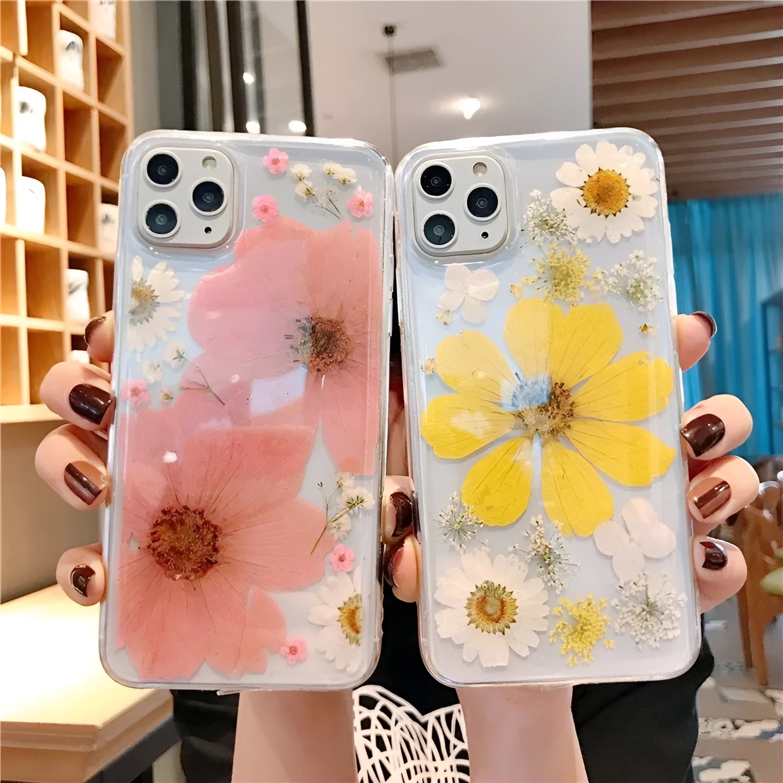 Floral patterned TPU phone case for iPhone showing large pink and yellow flower designs on back cover