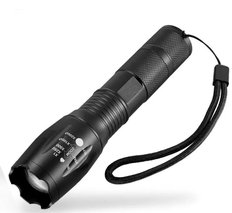 Black aluminium alloy zoomable LED flashlight showing adjustable head for focus control