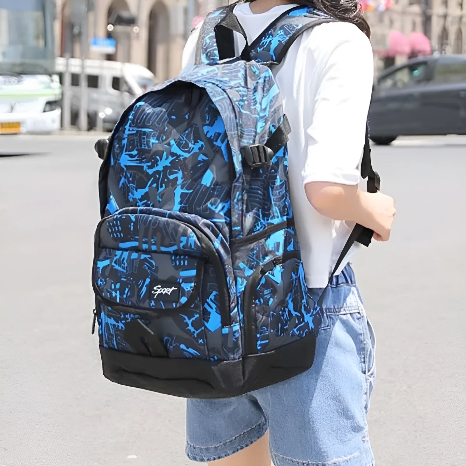 Blue and red classic nylon backpack with large main compartment for school and travel