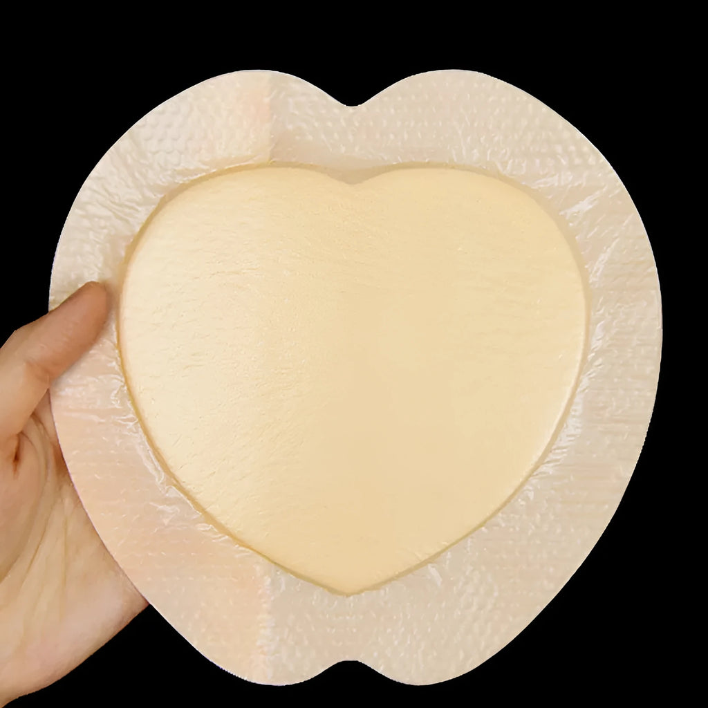 Large skin-coloured silicone foam bedsore sticker on white background