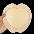 Large skin-coloured silicone foam bedsore sticker on white background