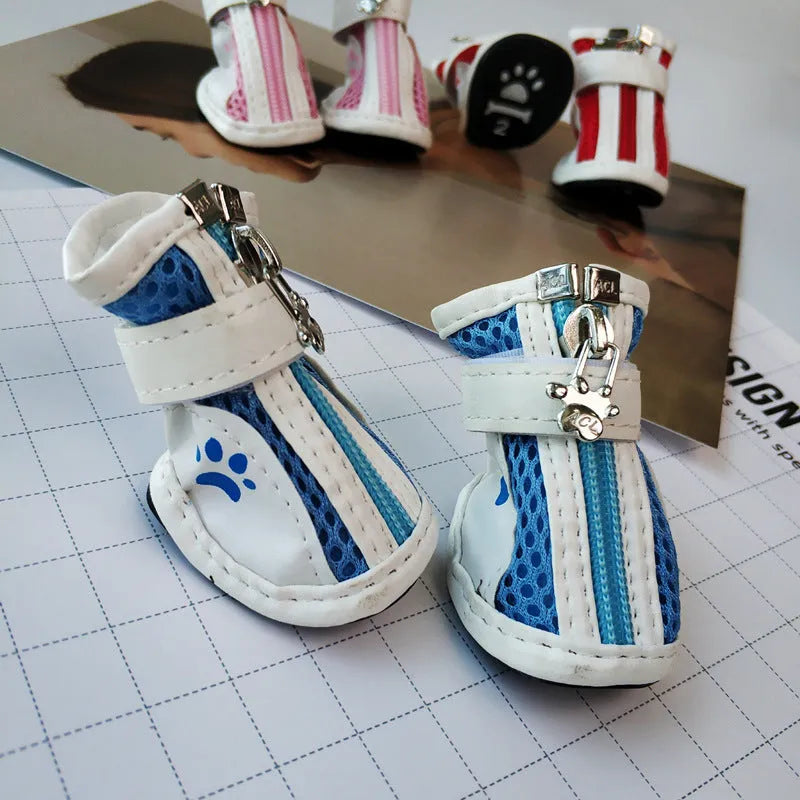 Blue zipper dog shoes with non-slip soles for small dogs, shown alongside pink and red colour options.