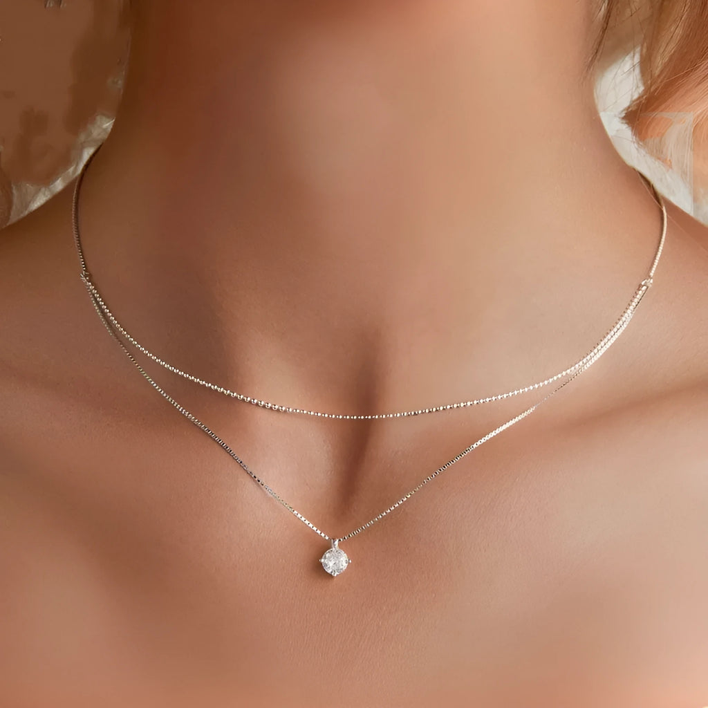 S925 sterling silver double-layer necklace with pearl chain in silver colour.