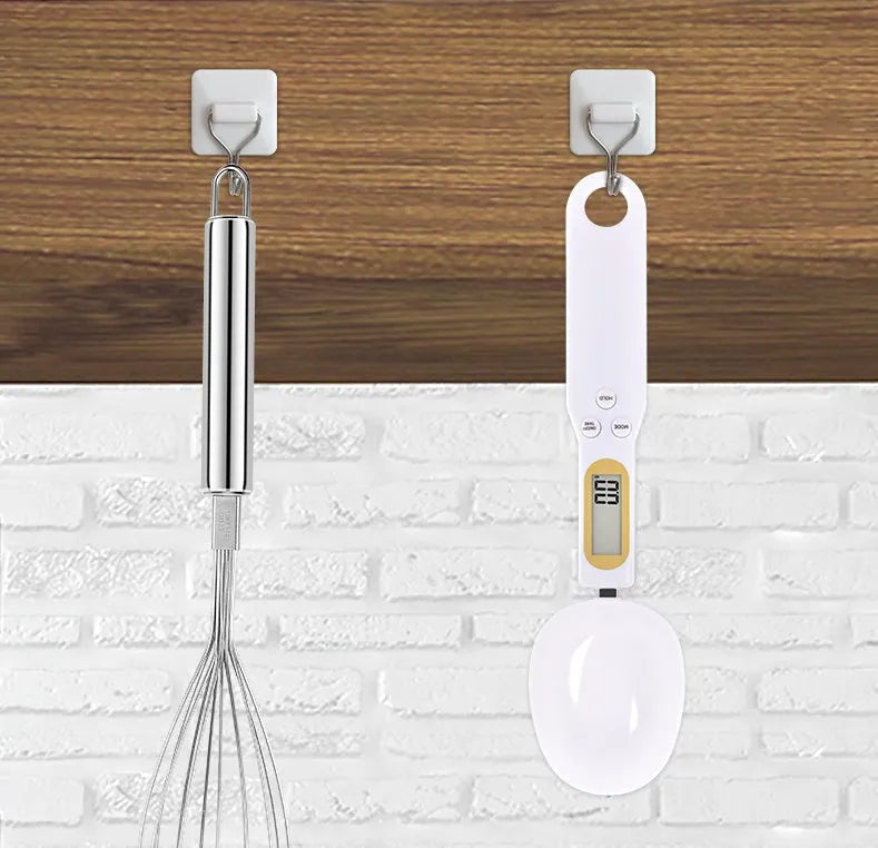 Electronic measuring spoon scale with digital display showing weight measurement