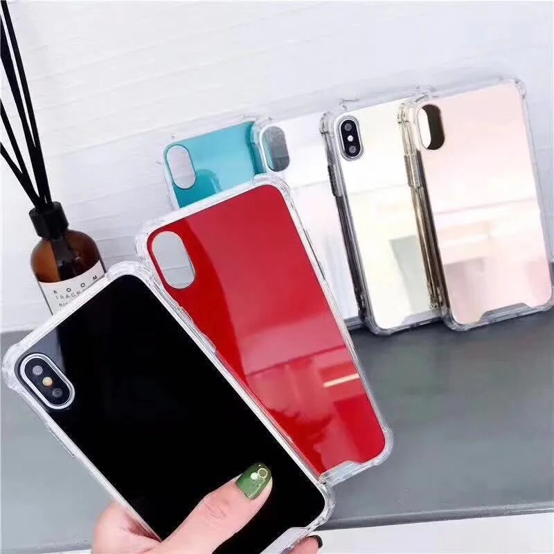 Mirror phone case for iPhone showing reflective back surface and soft TPU edges in multiple colour options.