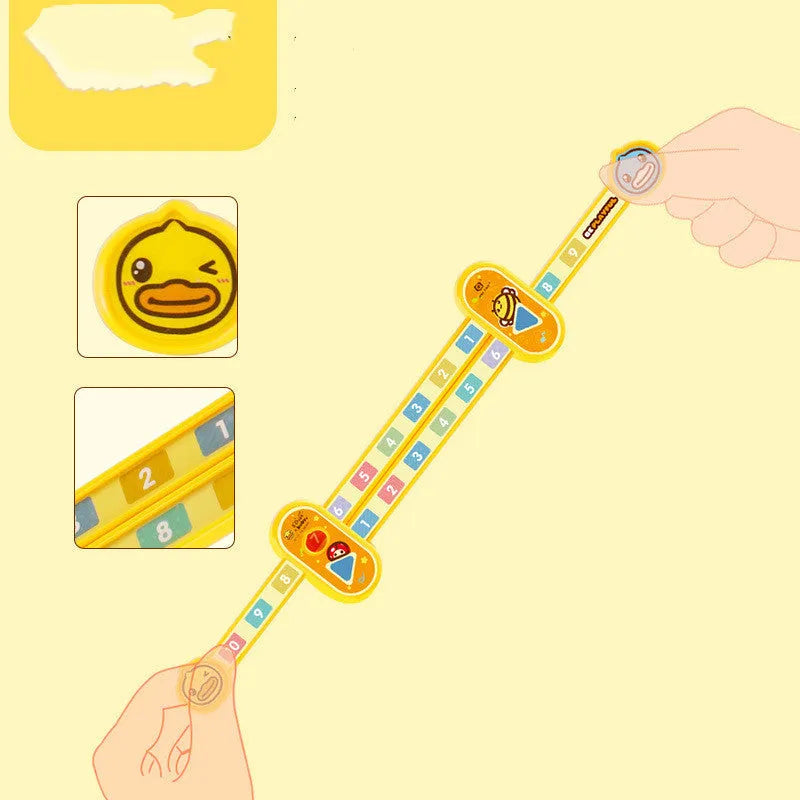 Yellow plastic children's digital decomposition ruler with cartoon graphics, showing 24.5 cm length.